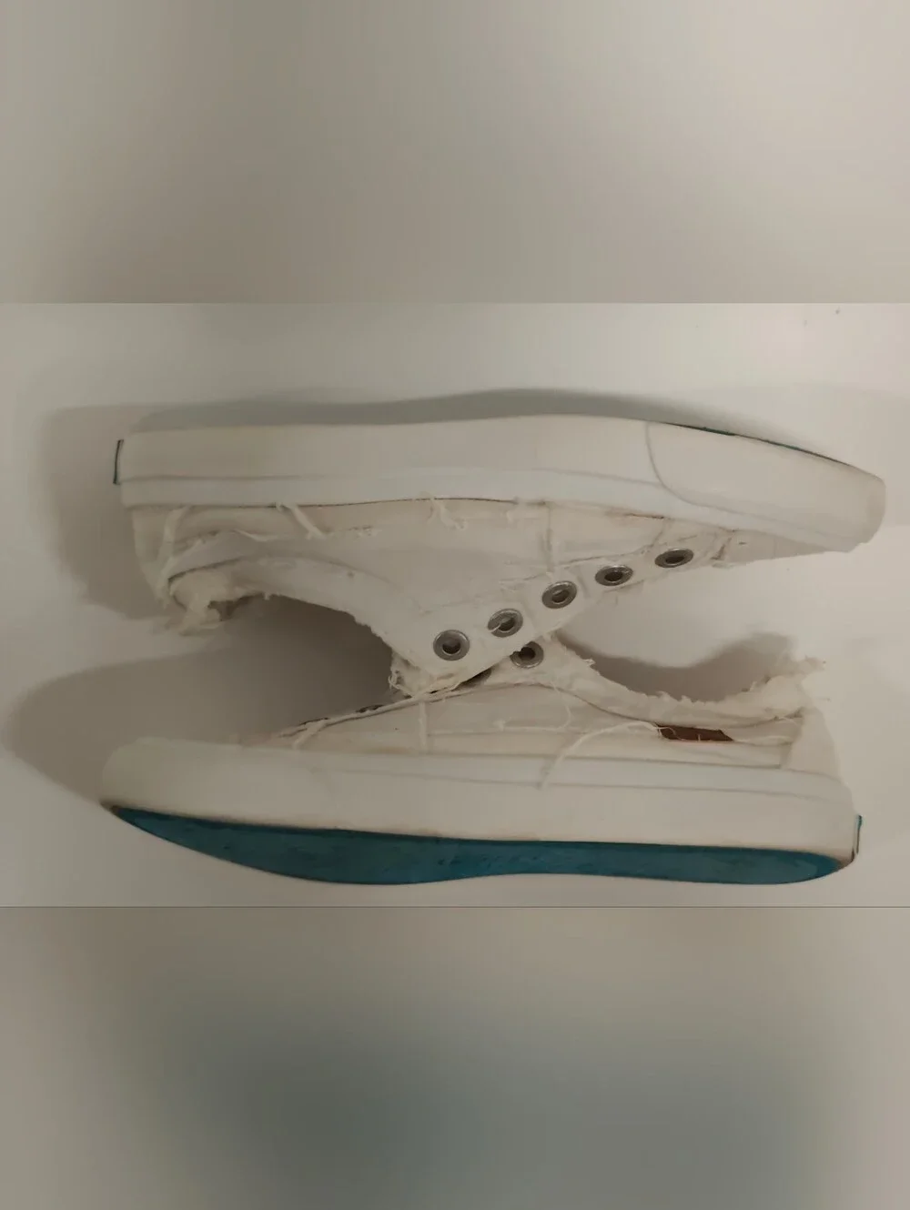 Women's White Canvas Slip-On Sneakers with Frayed Trim
